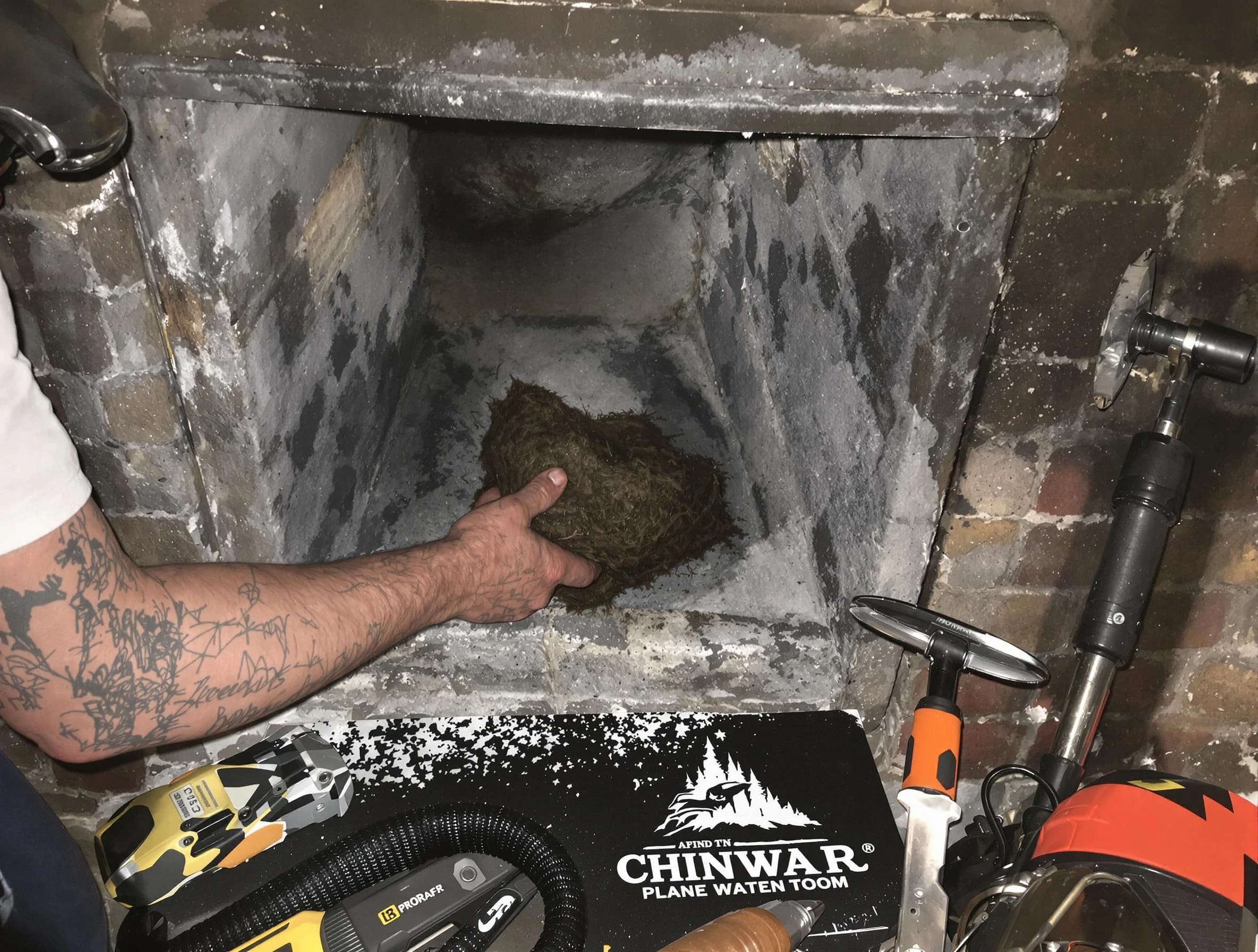 Brook Highland Chimney Sweep safely removing debris and screening chimney in Brook Highland, AL